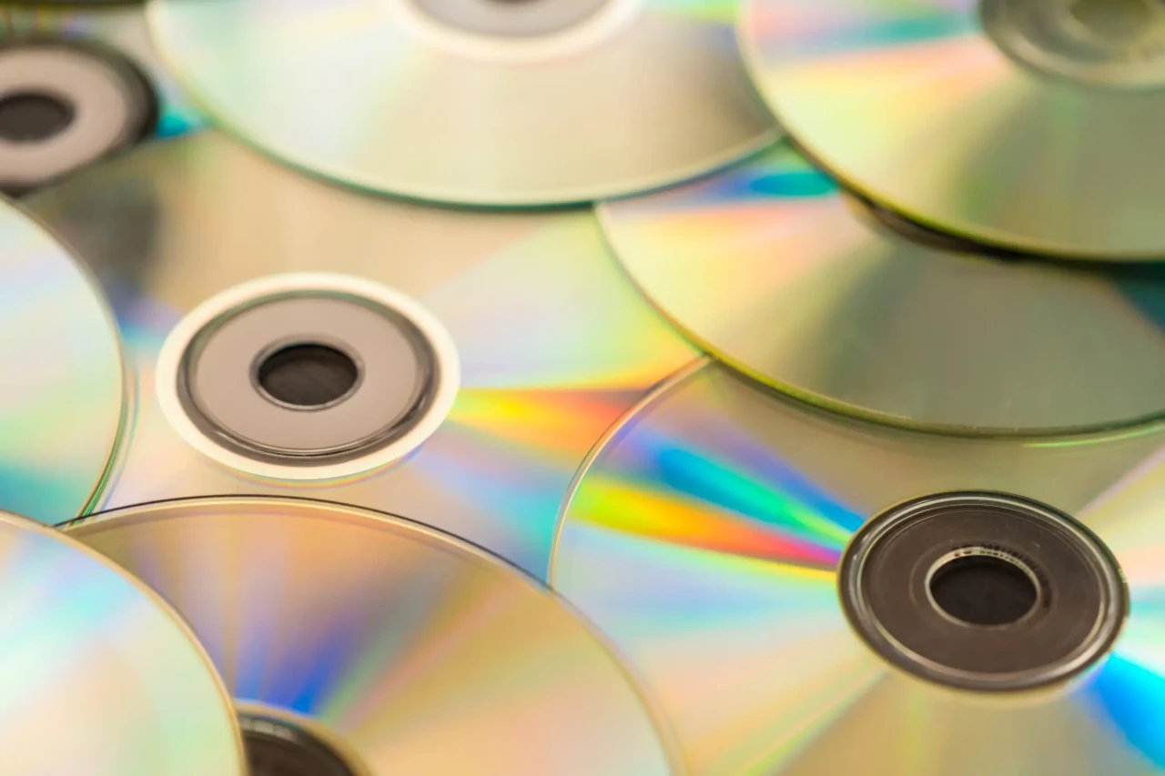 pile-of-cd-compact-discs-and-dvds.webp